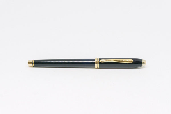 Cross Townsend rollerball pen in black lacquer finish with 23-karat gold accents